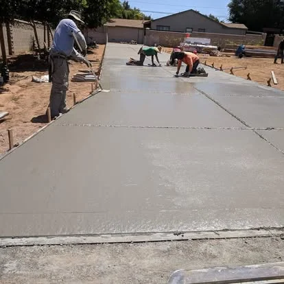 Crew finishing wide slab