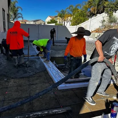 Crew screeding pour